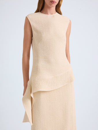 Proenza Schouler Detail image of model wearing Lorna Top in Striated Suiting in Ecru