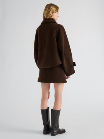 Proenza Schouler Back full length image of model wearing Clarice Skirt in Casentino Wool in Dark Brown