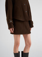 Proenza Schouler Detail image of model wearing Clarice Skirt in Casentino Wool in Dark Brown