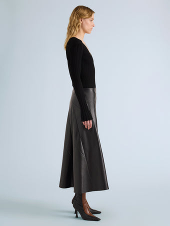 Proenza Schouler Side full length image of model wearing Kenza Skirt in Nappa Leather in Black