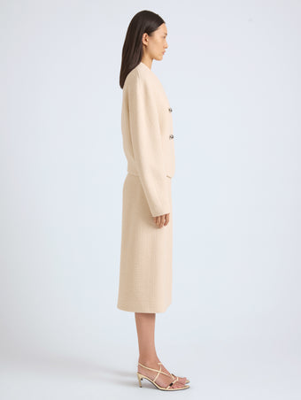 Proenza Schouler Side full length image of model wearing Lorna Skirt in Striated Suiting in Ecru