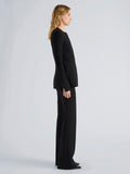 Proenza Schouler Side full length image of model wearing Sonia Pant in Bi-Stretch Suiting in Black