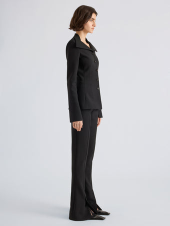 Proenza Schouler Side full length image of model wearing Dara Pant in Light Bi-Stretch Wool in Black