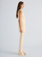 Proenza Schouler Side full length image of model wearing Dara Pant in Light Bi-Stretch Wool in Ecru