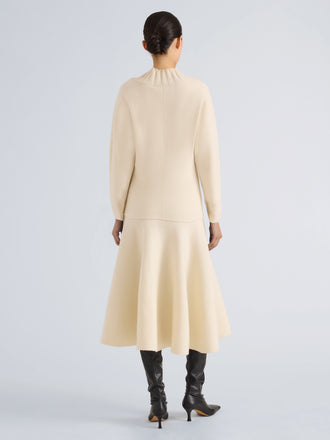 Proenza Schouler Back full length image of model wearing Lothea Top in Lofty Merino Wool in Ecru