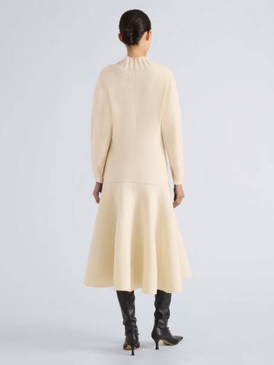 Proenza Schouler Back full length image of model wearing Lothea Top in Lofty Merino Wool in Ecru