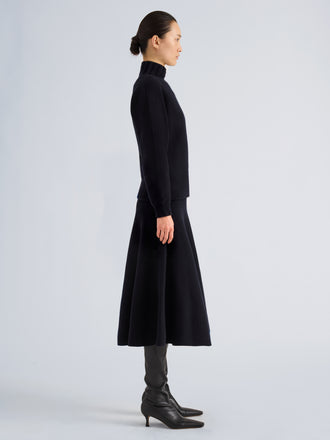 Proenza Schouler Side full length image of model wearing Lothea Top in Lofty Merino Wool in Navy Melange