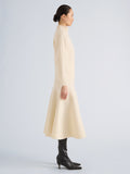 Proenza Schouler Side full length image of model wearing Lothea Skirt in Lofty Merino Wool in Ecru