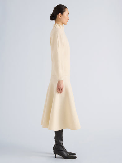Proenza Schouler Side full length image of model wearing Lothea Skirt in Lofty Merino Wool in Ecru