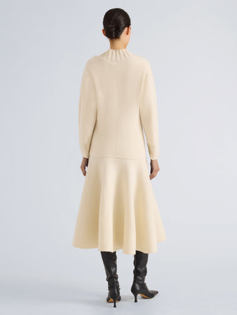 Proenza Schouler Back full length image of model wearing Lothea Skirt in Lofty Merino Wool in Ecru