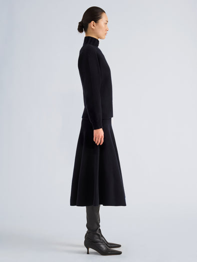 Proenza Schouler Side full length image of model wearing Lothea Skirt in Lofty Merino Wool in Navy Melange