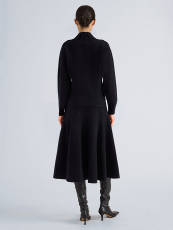 Proenza Schouler Back full length image of model wearing Lothea Skirt in Lofty Merino Wool in Navy Melange