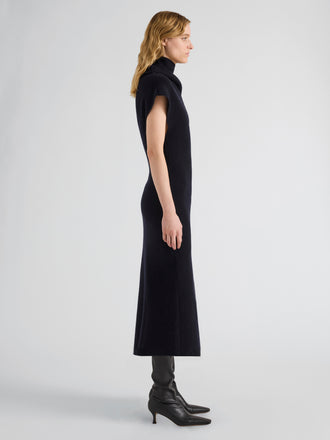 Proenza Schouler Side full length image of model wearing Lothea Dress in Lofty Merino Wool in Navy Melange