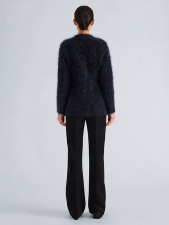 Proenza Schouler Back full length image of model wearing Aniza Cardigan in Brushed Mohair in Navy Black