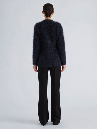Proenza Schouler Back full length image of model wearing Aniza Cardigan in Brushed Mohair in Navy Black