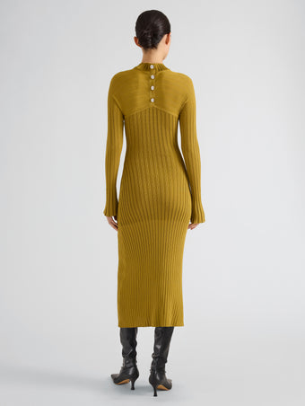 Proenza Schouler Back full length image of model wearing Roux Dress in Viscose Silk Rib in Gold
