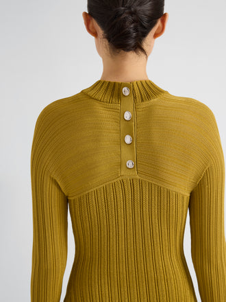 Proenza Schouler Detail image of model wearing Roux Dress in Viscose Silk Rib in Gold