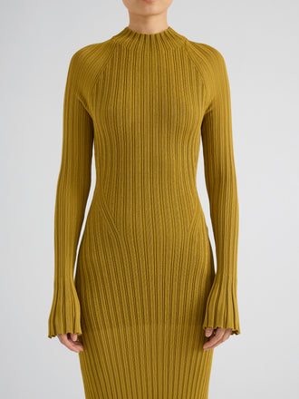 Proenza Schouler Detail image of model wearing Roux Dress in Viscose Silk Rib in Gold