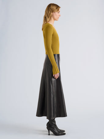 Proenza Schouler Side full length image of model wearing Roux Top in Viscose Silk Rib in Gold