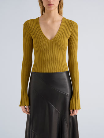 Proenza Schouler Detail image of model wearing Roux Top in Viscose Silk Rib in Gold