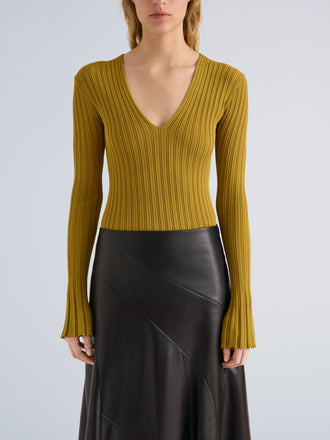 Proenza Schouler Detail image of model wearing Roux Top in Viscose Silk Rib in Gold