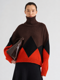 Proenza Schouler Front cropped image of model wearing Oren Intarsia Turtleneck in Cashmere Wool in Red Multi