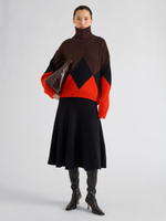Proenza Schouler Front full length image of model wearing Oren Intarsia Turtleneck in Cashmere Wool in Red Multi