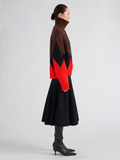 Proenza Schouler Side full length image of model wearing Oren Intarsia Turtleneck in Cashmere Wool in Red Multi