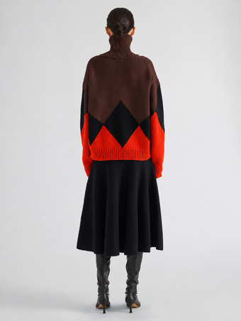 Proenza Schouler Back full length image of model wearing Oren Intarsia Turtleneck in Cashmere Wool in Red Multi