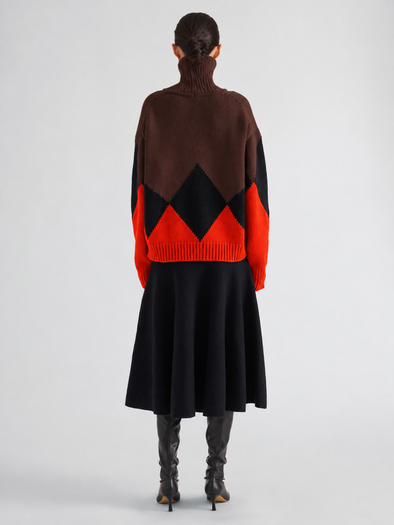 Proenza Schouler Back full length image of model wearing Oren Intarsia Turtleneck in Cashmere Wool in Red Multi
