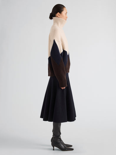 Proenza Schouler Side full length image of model wearing Oren Intarsia Turtleneck in Cashmere Wool in Raisin Multi