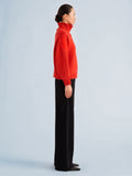 Proenza Schouler Side full length image of model wearing Oren Turtleneck in Cashmere Wool in Flame