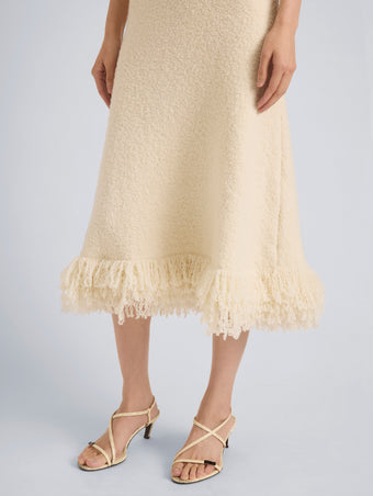 Proenza Schouler Detail image of model wearing Frida Dress in Wool Boucle in Off White