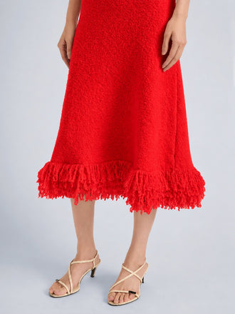 Proenza Schouler Detail image of model wearing Frida Dress in Wool Boucle in Poppy
