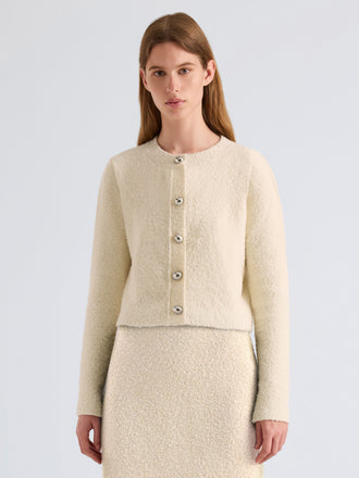 Proenza Schouler Front cropped image of model wearing Frida Cardigan in Wool Boucle in Off White