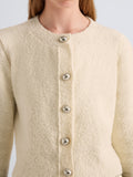 Proenza Schouler Detail image of model wearing Frida Cardigan in Wool Boucle in Off White