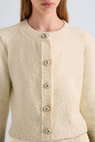 Proenza Schouler Detail image of model wearing Frida Cardigan in Wool Boucle in Off White