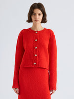 Proenza Schouler Front cropped image of model wearing Frida Cardigan in Wool Boucle in Poppy
