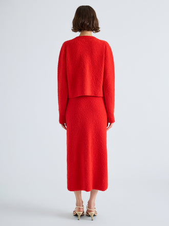 Proenza Schouler Back full length image of model wearing Frida Cardigan in Wool Boucle in Poppy