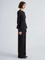 Proenza Schouler Side full length image of model wearing Dasha Jacket in Compact Viscose in Black