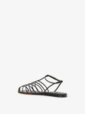 3/4 Back image of Tee Cage Flat Sandals in BLACK