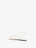 3/4 Back image of Tee Cage Flat Sandals in WHITE