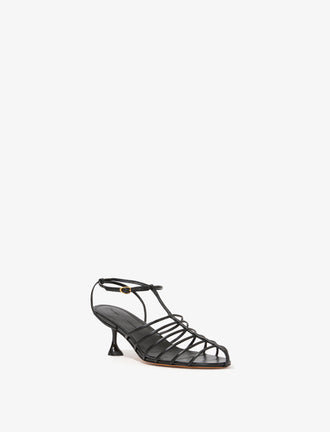 3/4 Front image of Tee Cage Sandals in BLACK