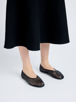 Image of model wearing Tee Perforated Ballerina Flats in BLACK