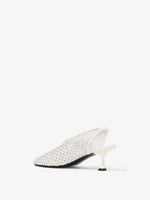 3/4 Back image of Tee Perforated Slingback Pumps in IVORY