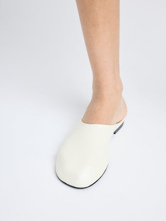 Image of model wearing Glove Slippers in IVORY