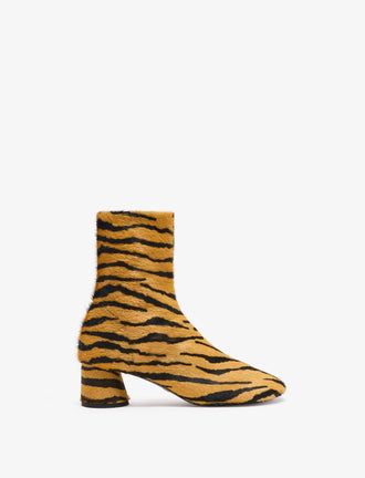 Proenza Schouler side image of Glove Ankle Boots in Haircalf in orange/black