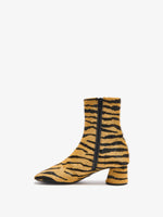 Proenza Schouler back image of Glove Ankle Boots in Haircalf in orange/black