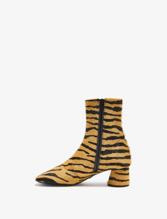 Proenza Schouler back image of Glove Ankle Boots in Haircalf in orange/black