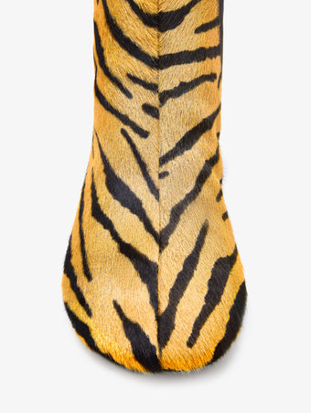 Proenza Schouler aerial image of Glove Ankle Boots in Haircalf in orange/black